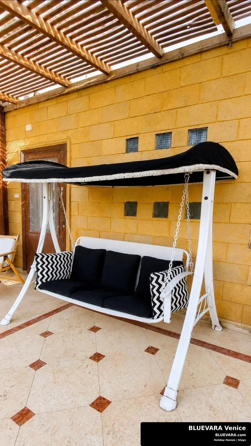 Covered swing